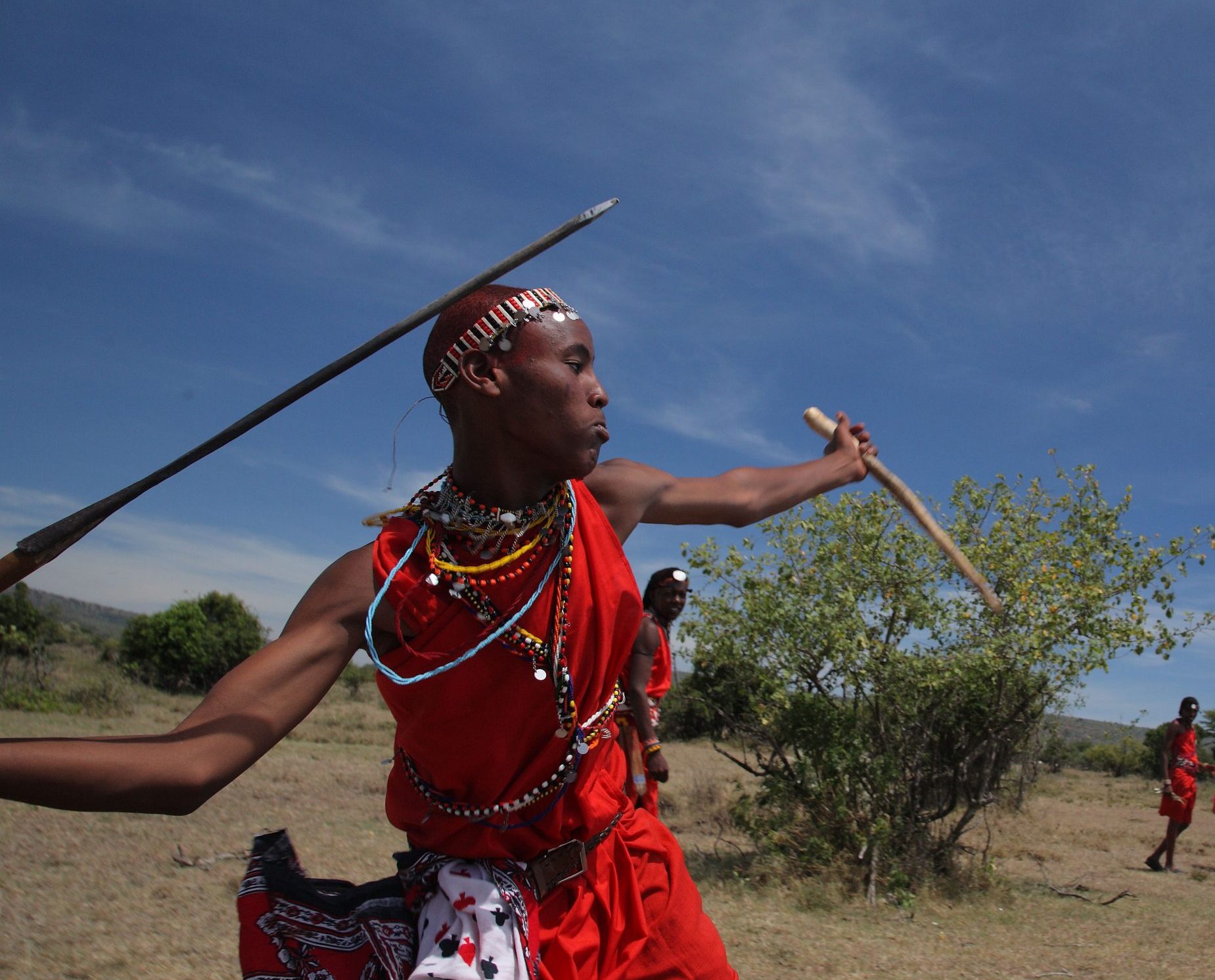 Maasai-warrior-throwing-a-spear-scaled-e1588336584493.jpg